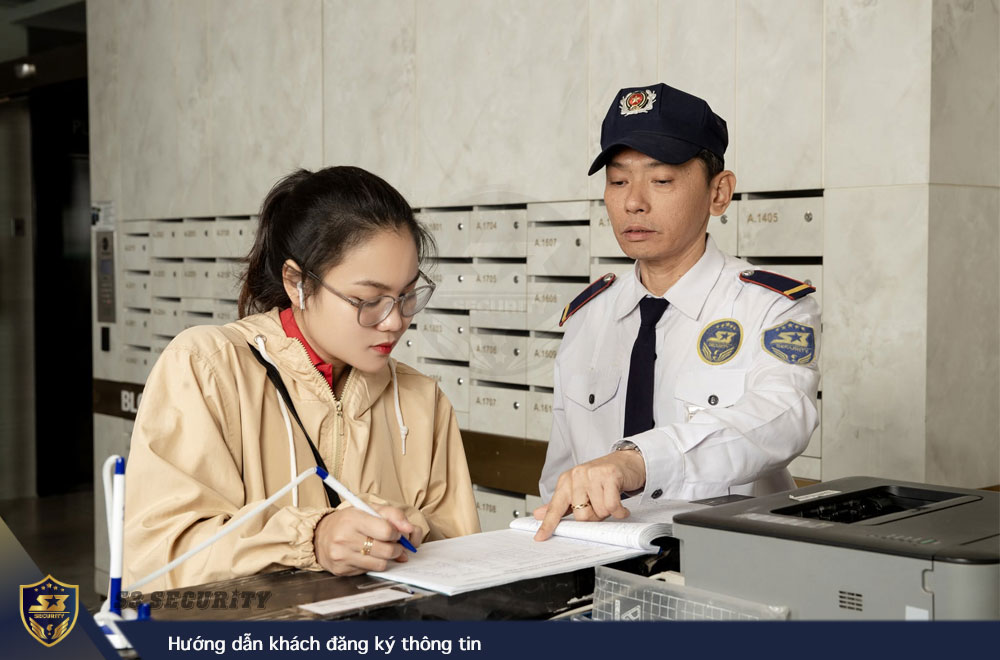 Nhân viên bảo vệ vị trí sảnh toà nhà Huong-dan-khach-dang-ky-thong-tin